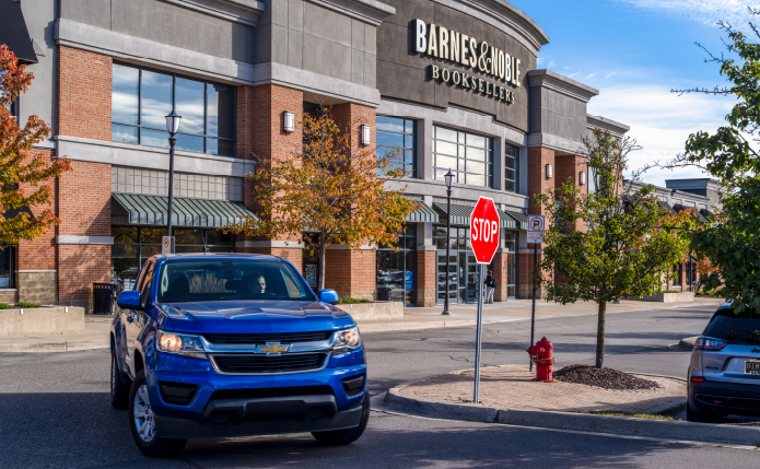 Blue SUV in front of Barnes & Noble.