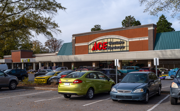 Busy parking lot at ACE Hardware store.