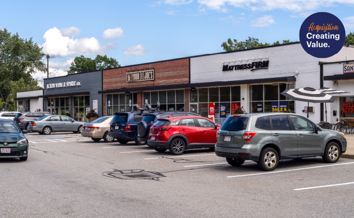 Busy parking lot at Mattress Firm and Not Your Average Joe's restaurant.