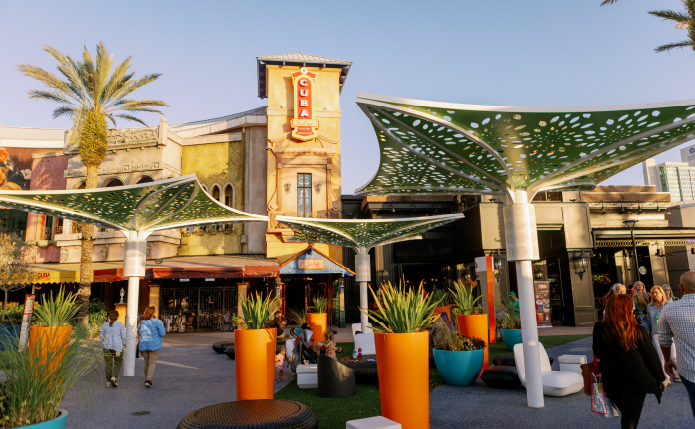 Inner courtyard with canopies and palm trees at Pointe Orlando.