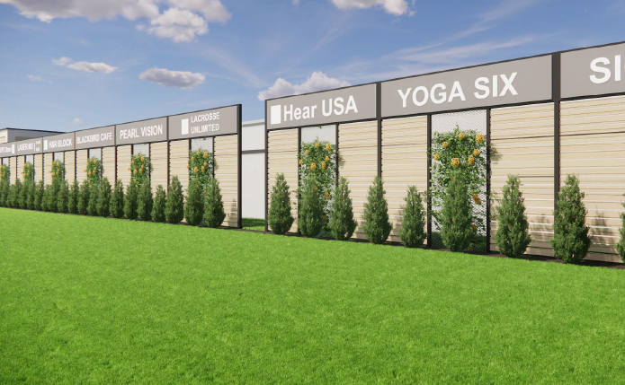 Rendering of shop walls with green lawn and trees in front.