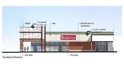 Architectural rendering of the updated Burlington storefront at Capitol Shopping Center in Concord, NH, showing redesigned façade materials including brick, clear glass storefronts, and parapet enhancements in the southeast elevation.