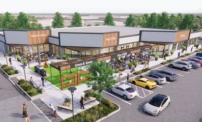 Aerial rendering of Morris Hills Shopping Center redevelopment featuring new restaurant and retail space with outdoor dining patios, landscaped gathering areas, pedestrian walkways, public seating, and improved parking designed to enhance the customer experience.
