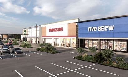 Rendering of retail storefronts at Rockland Plaza in Nanuet, NY, including Livingston and Five Below, shown with updated contemporary façades, large windows, landscaped parking islands, and an expansive drive aisle in the foreground.