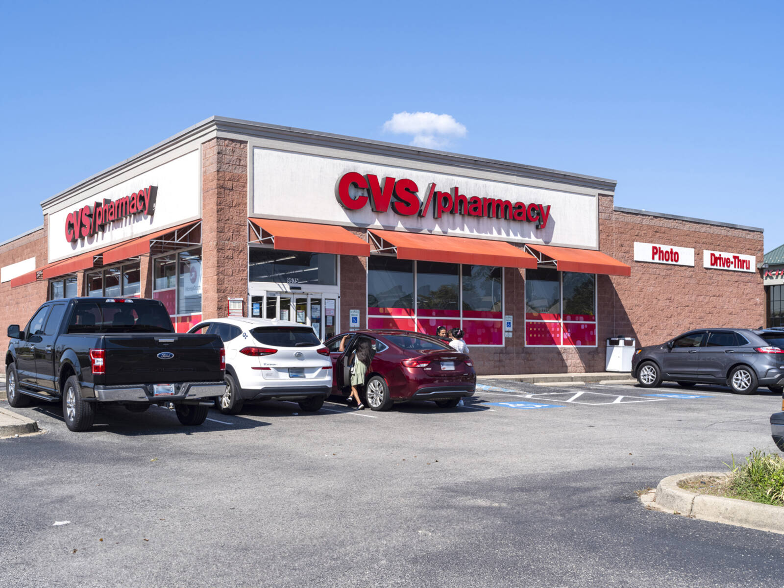 Busy parking lot at CVS Pharmacy.