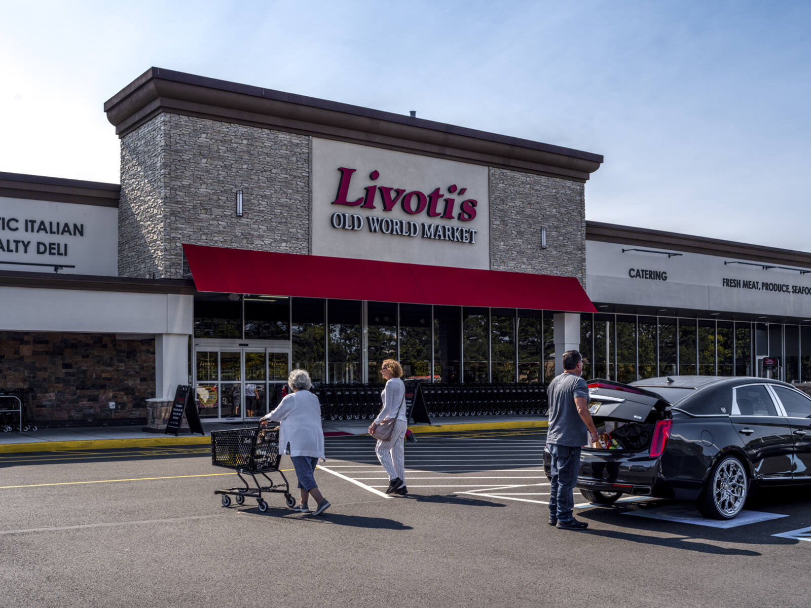 Livoti's Old World Market with two women entering store.