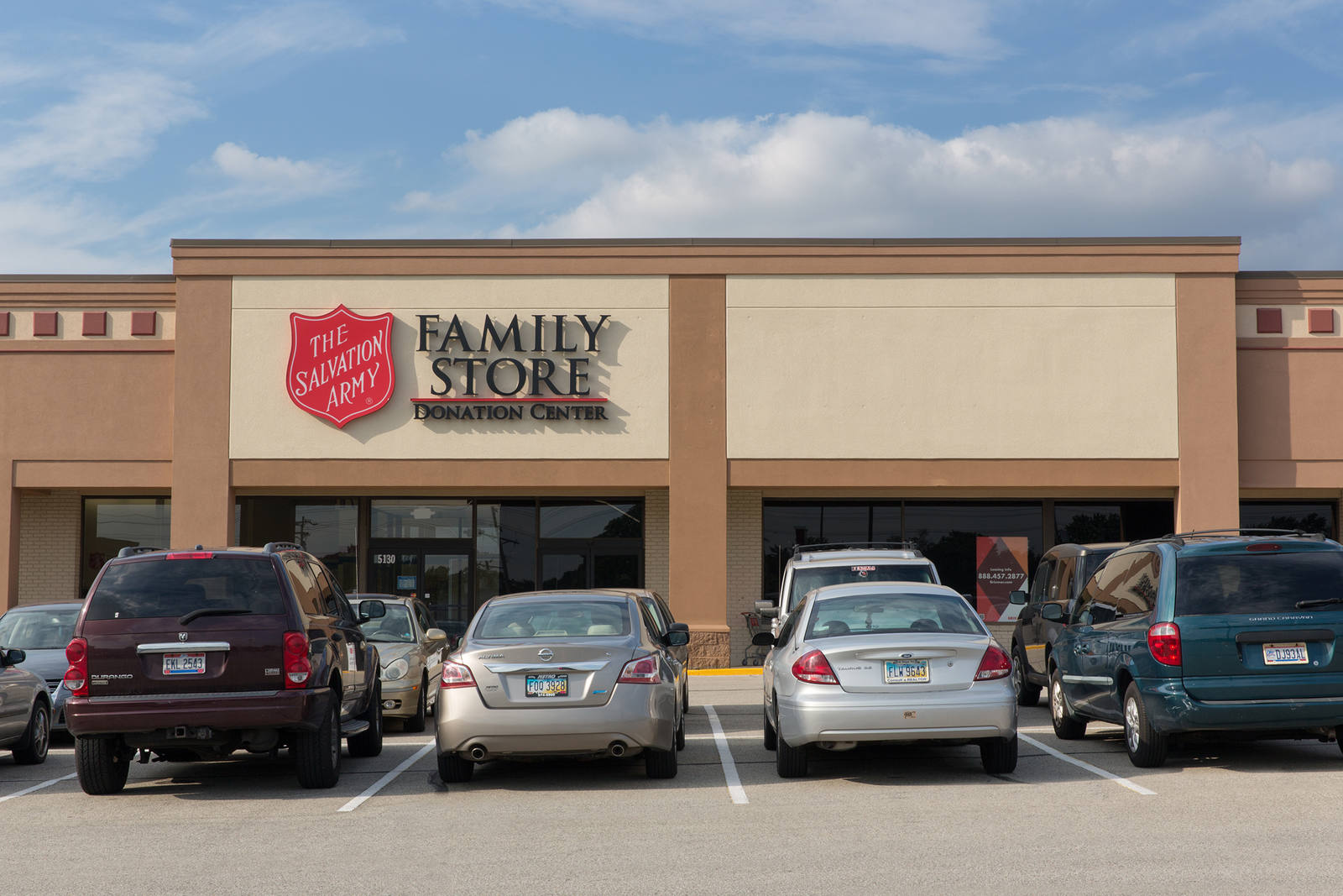 The Salvation Army Family Store with busy parking lot in Cincinnati, OH.