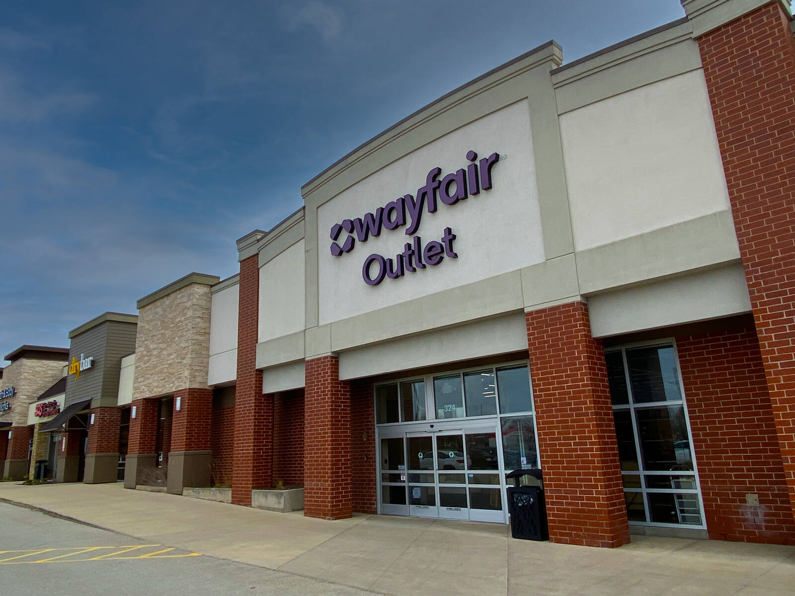 Wayfair Outlet storefront on overcast day.