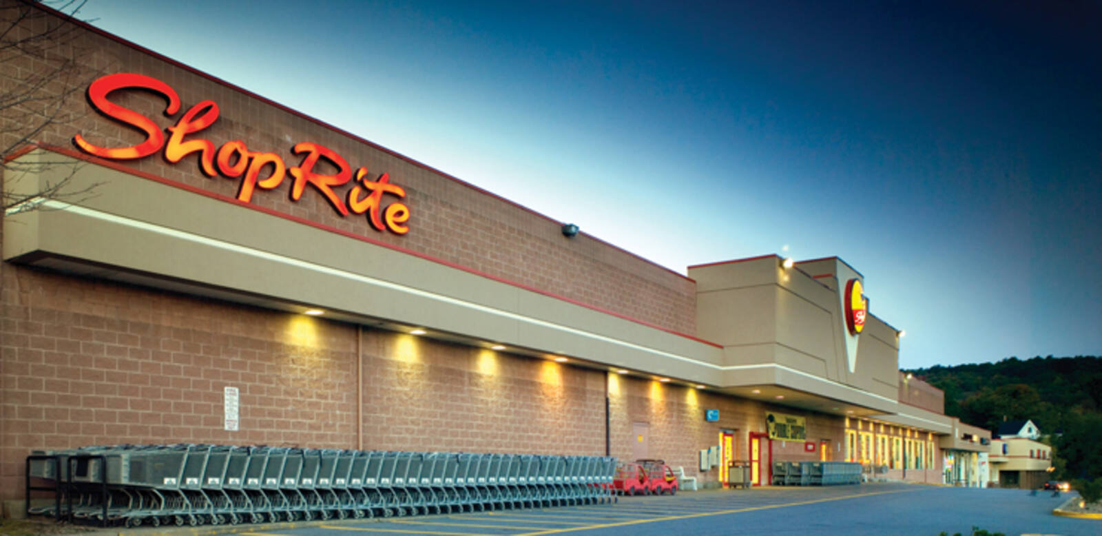 Carts line the entrance of Shoprite supermarket at Monroe Plaza.