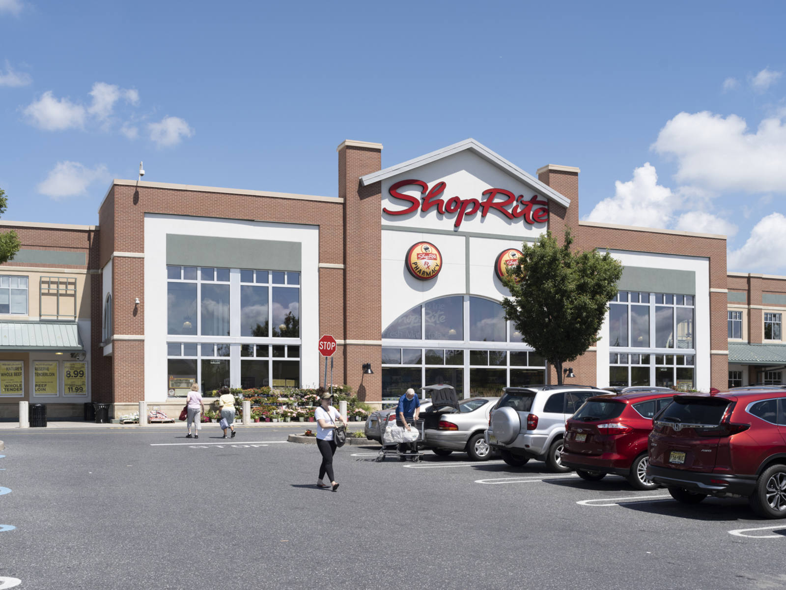 Car lined parking lot of ShopRite at The Shoppes at Cinnaminson