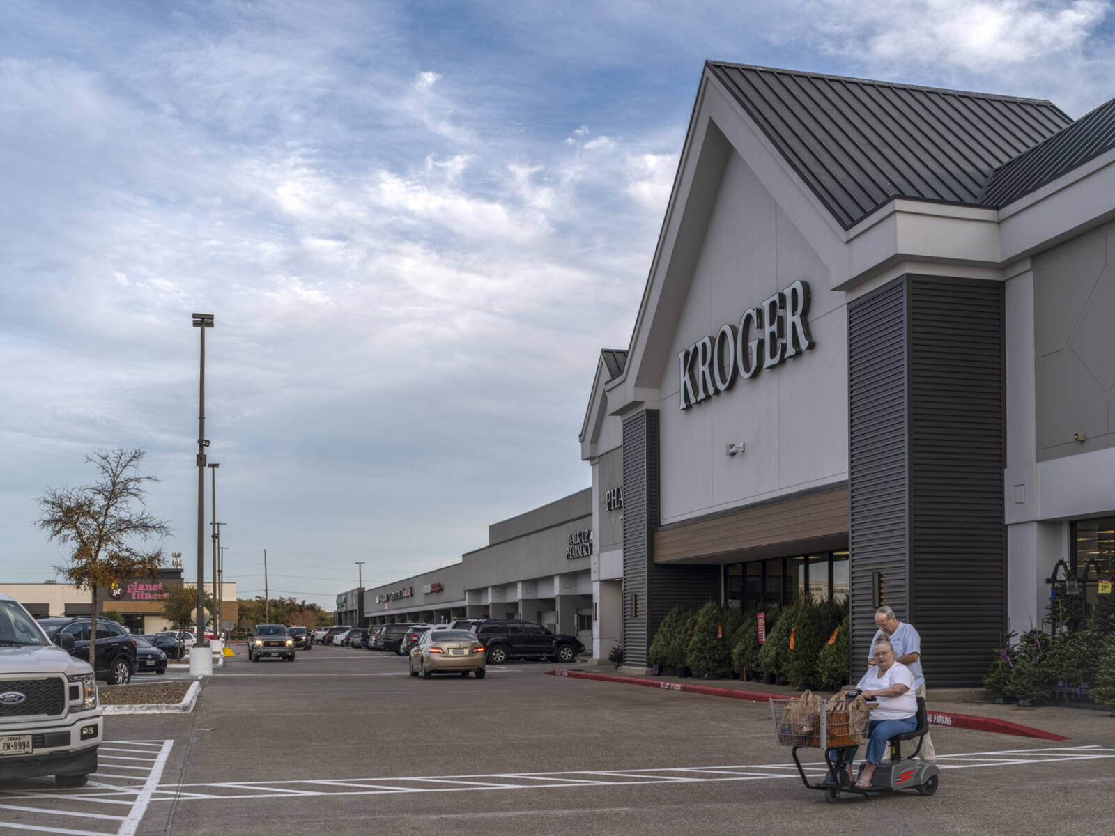 Kroger entrance with access road to parking lot.