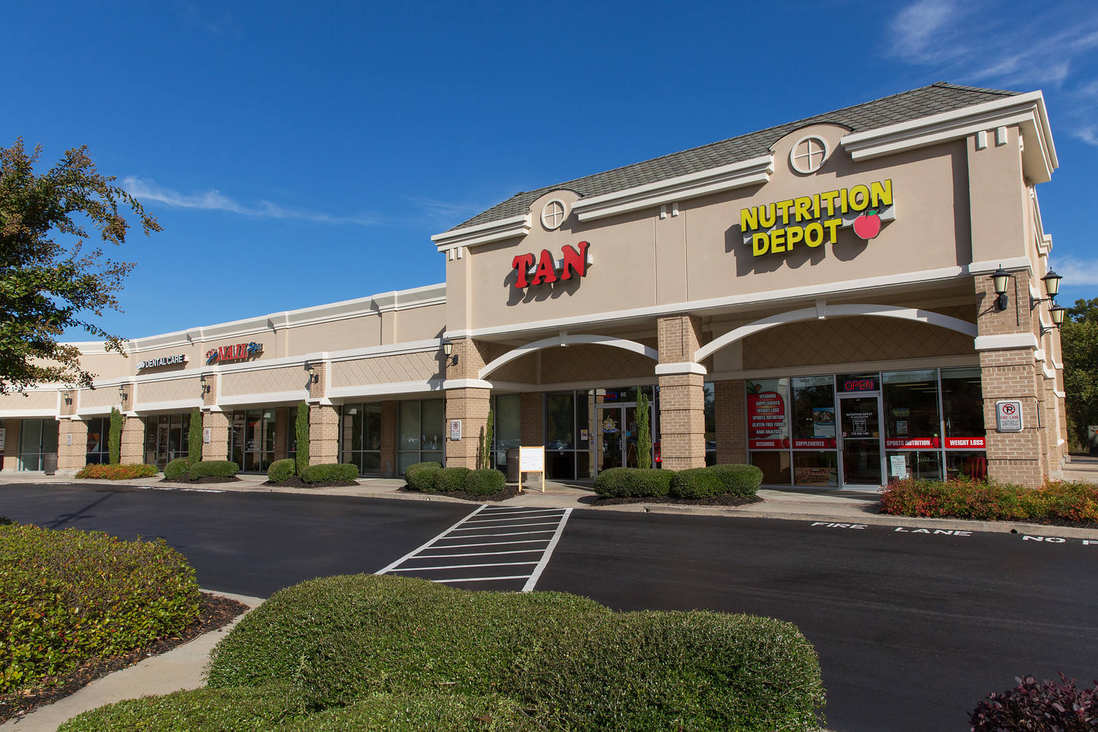Front facades of Nutrition Depot and Tan
