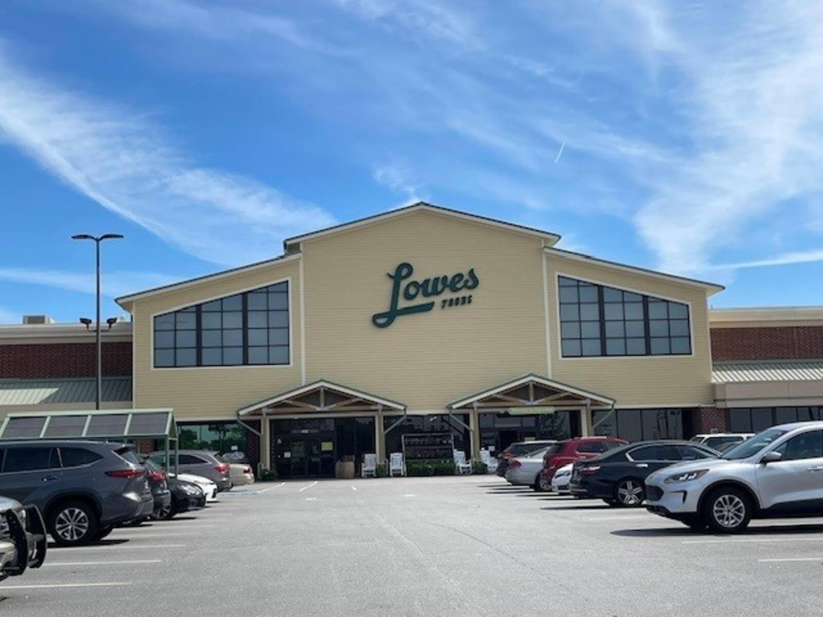 Busy parking lot in front of Lowe's.