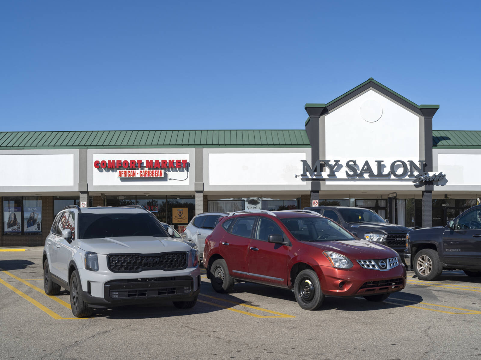 SUVs parked in front of My Salon.