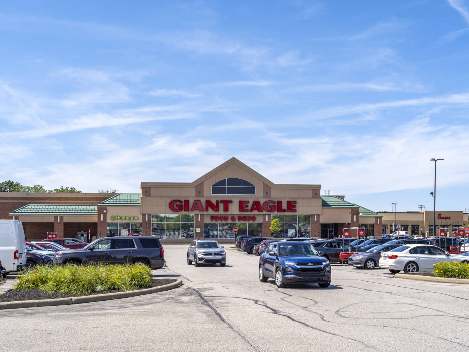 Cars exit parking lot at Giant Eagle supermarket in Brunswick, OH.