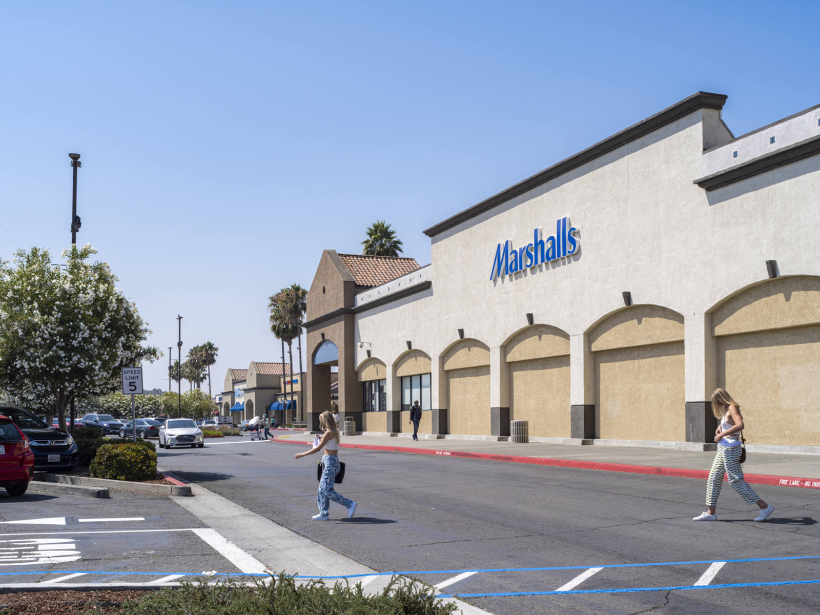 Women in crosswalk at Marshalls in Vallejo, CA.