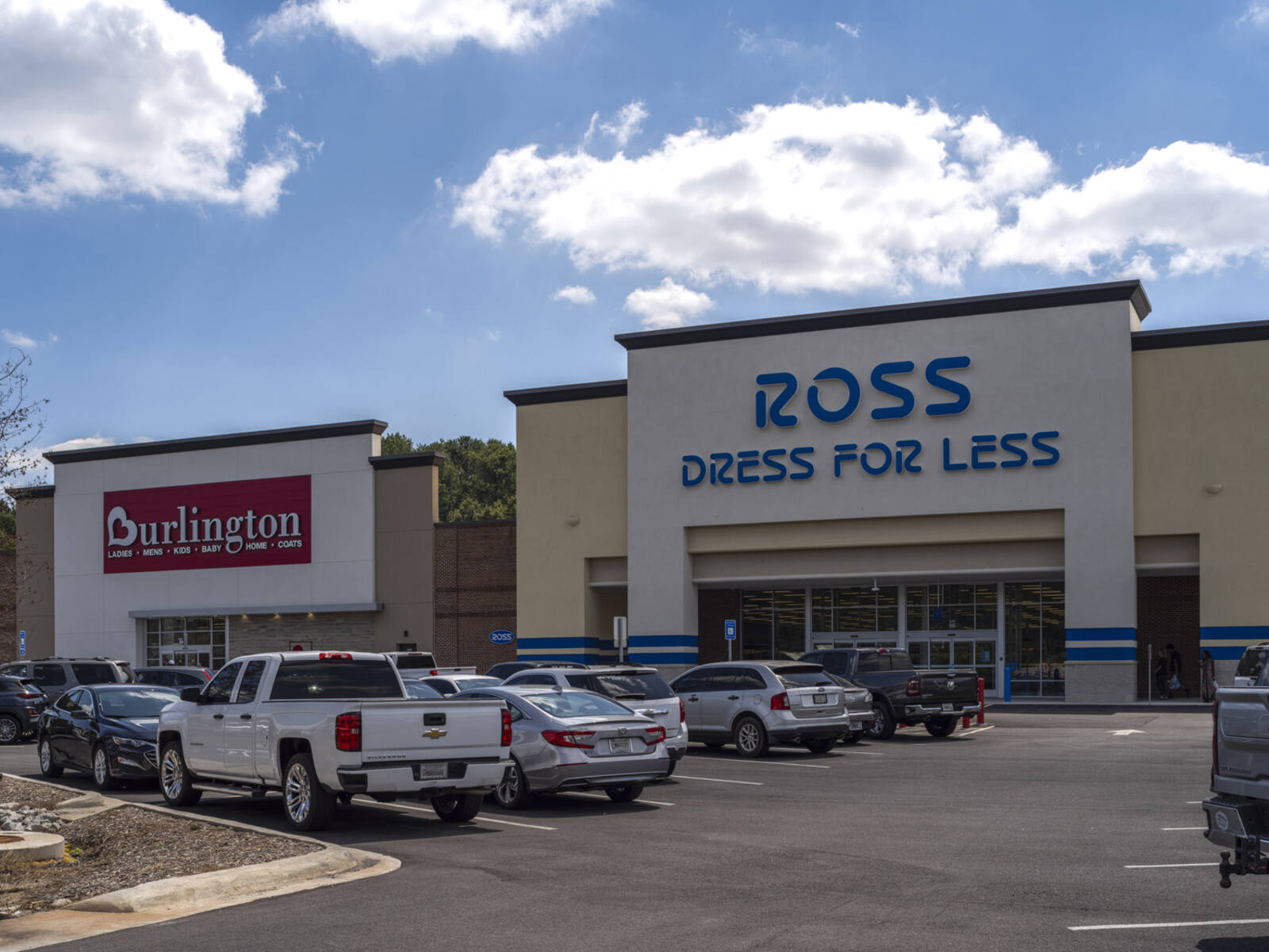 Busy parking lot in front of Ross and Burlington stores.