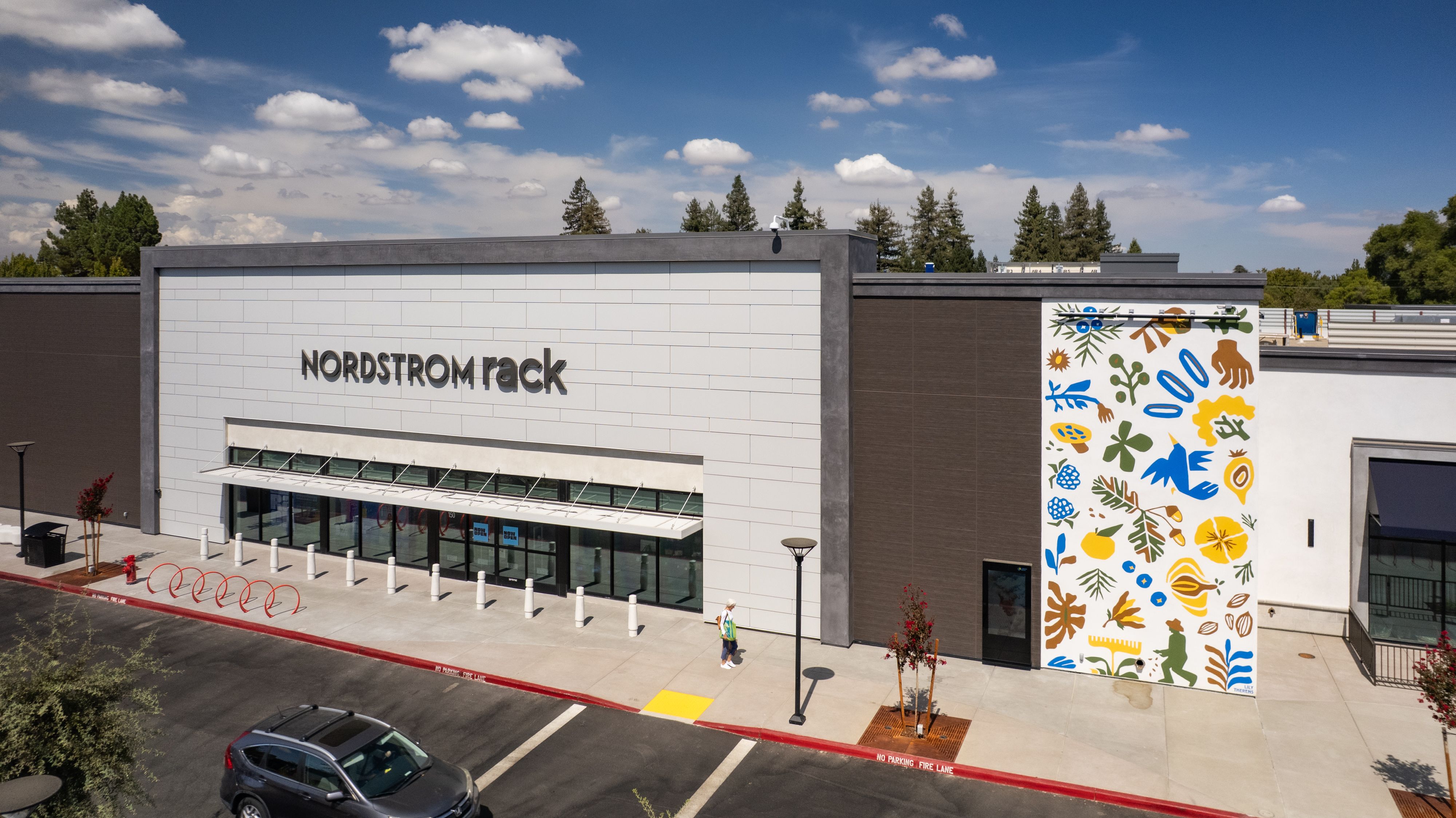 Exterior view of Nordstrom Rack with mural on corner of building at The Davis Collection in Davis, CA