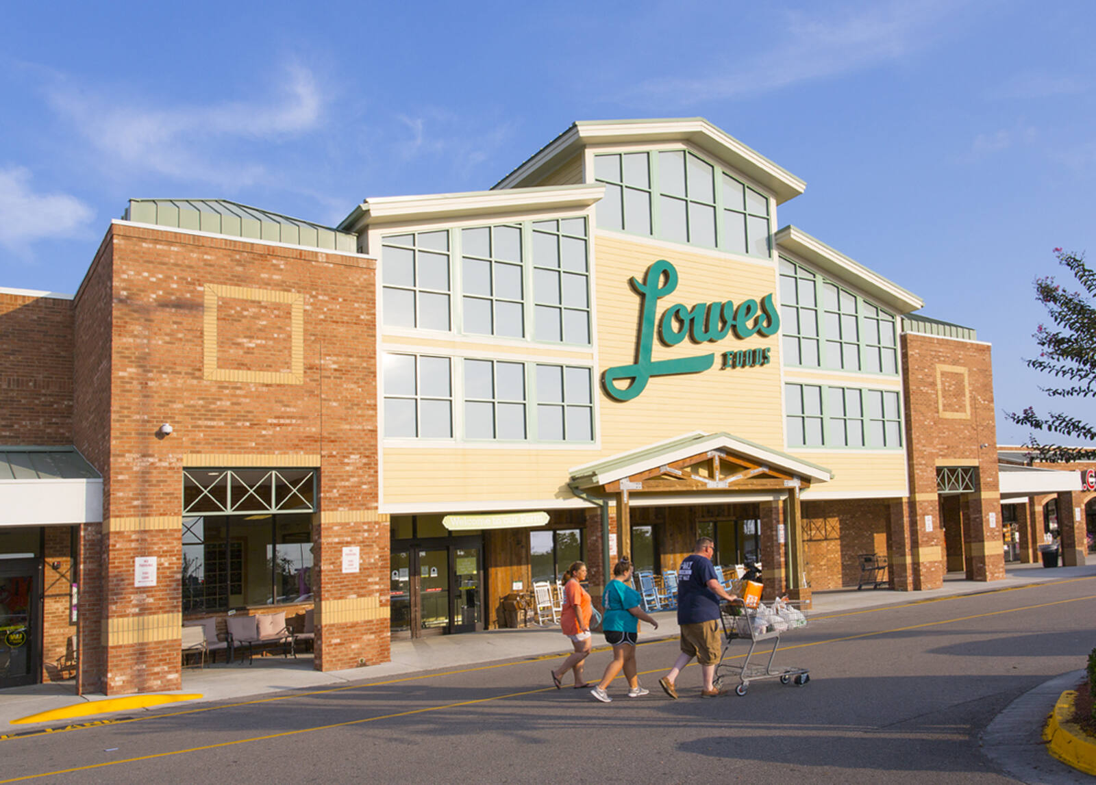 Family walking outside of Lowe's