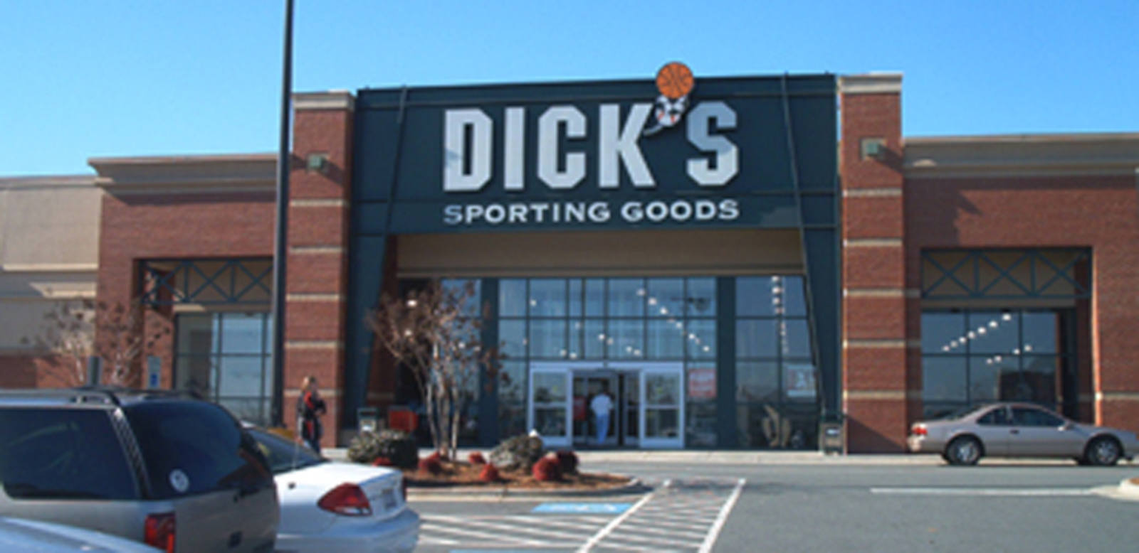 Cars parked in the entrance of Dick's Sporting Goods at Wendover Place Shopping Center