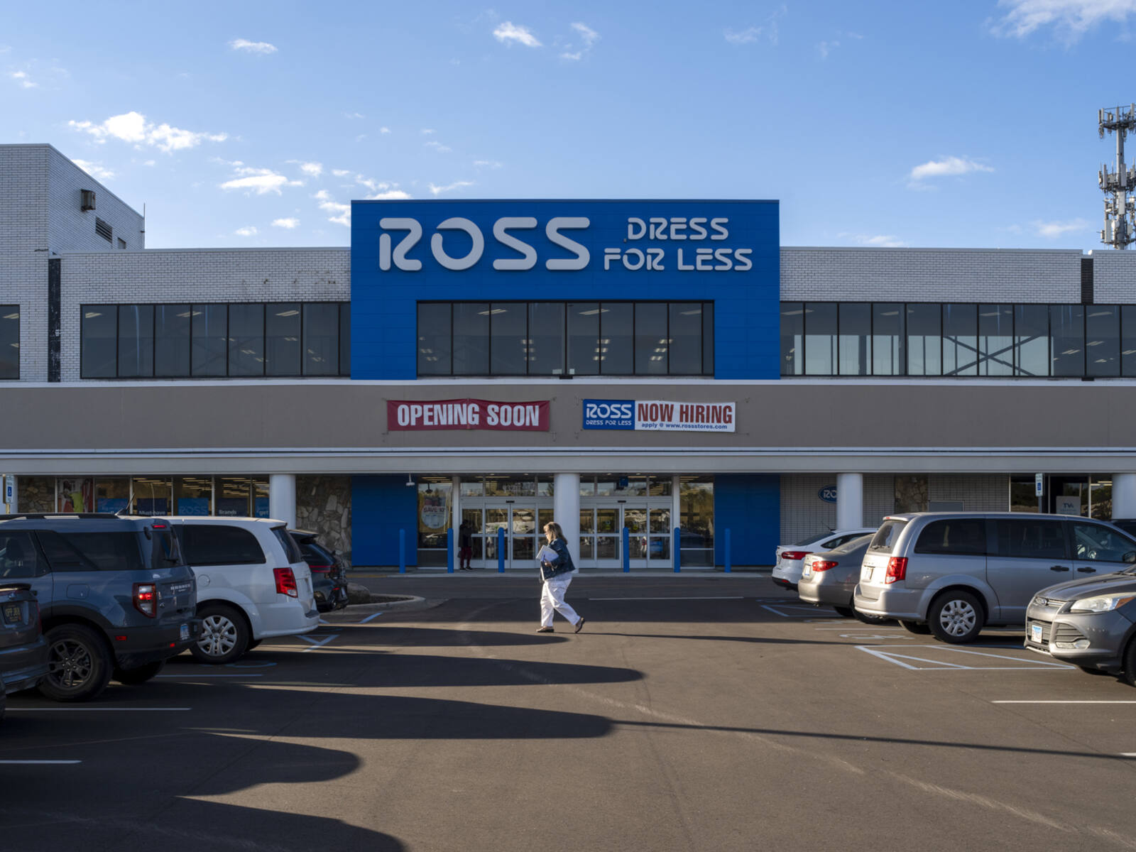 Busy aisles in parking lot in front of Ross Dress for Less.