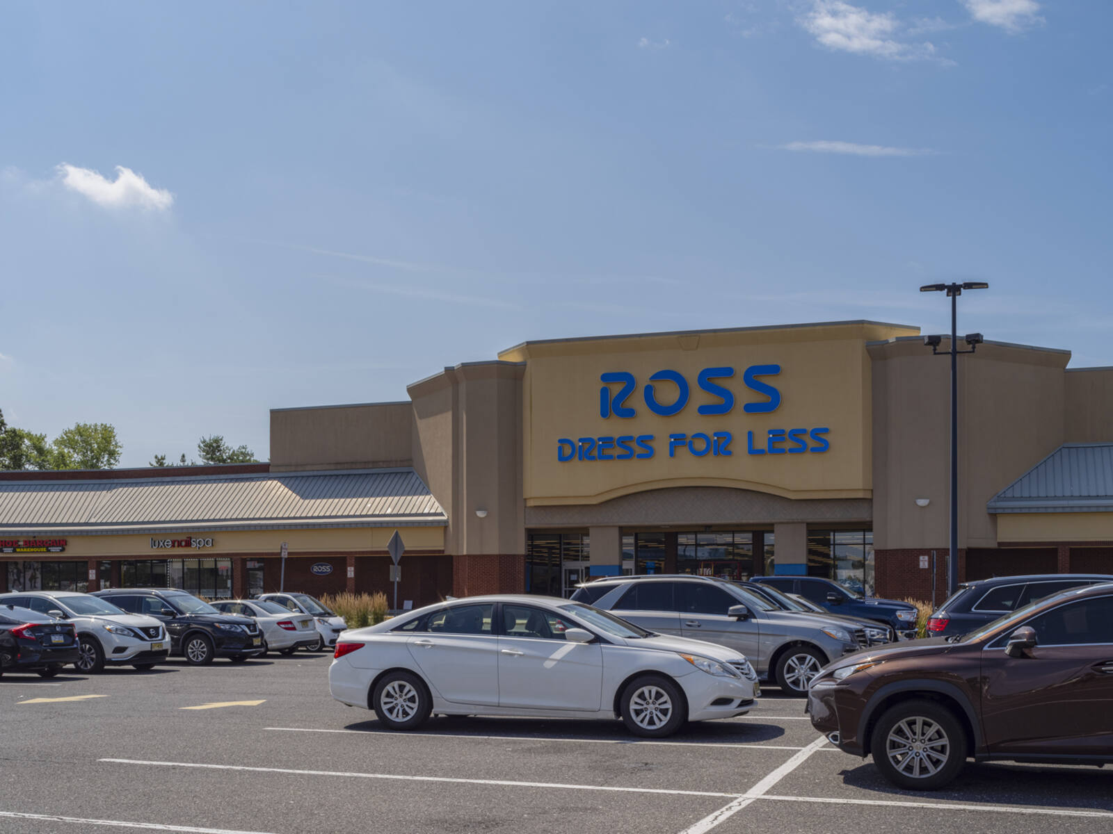 Rows of cars parked Ross Dress for Less department store in Turnersville, NJ.