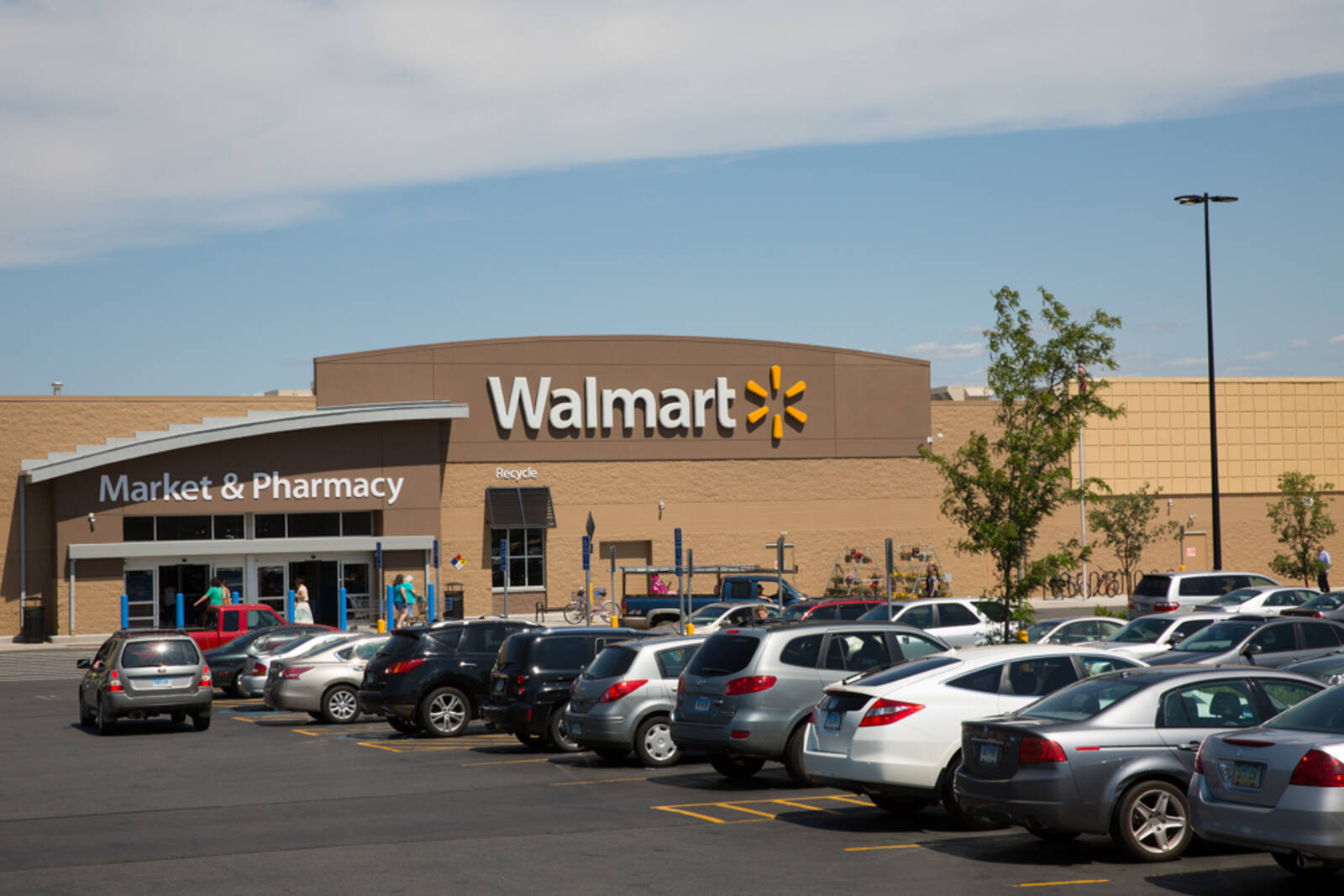 Busy parking lot in front of Walmart.