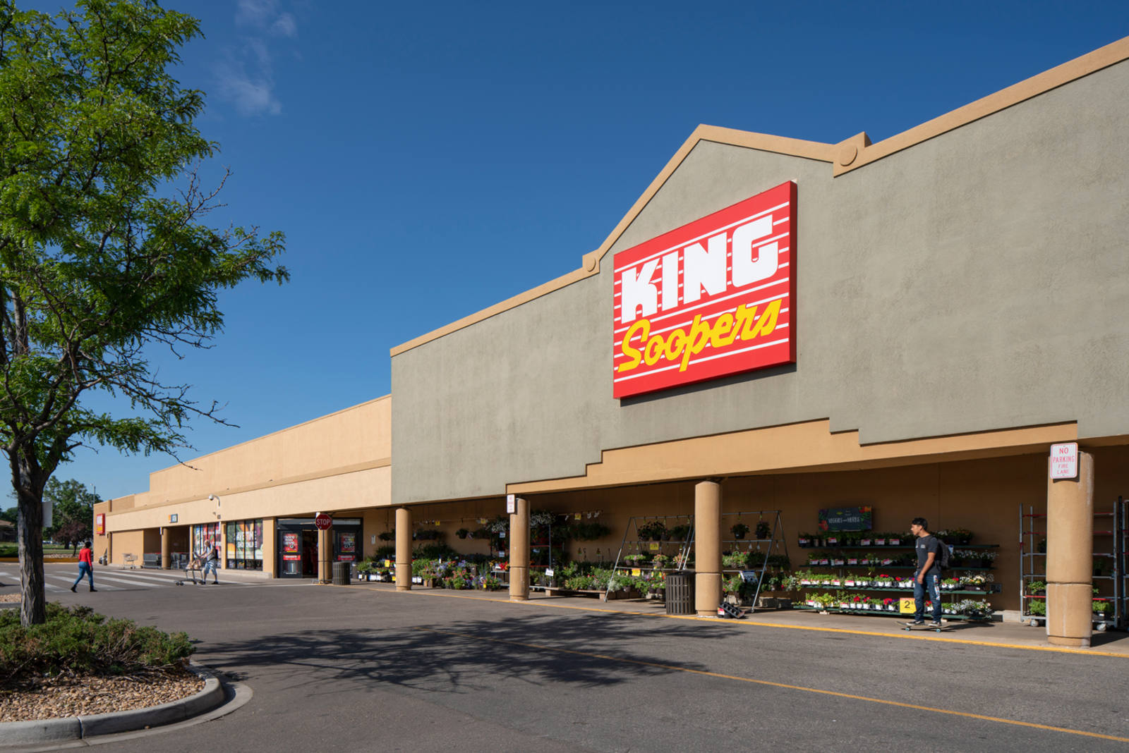 Shoppers enter a King Soopers supermarket in Aurora, CO.