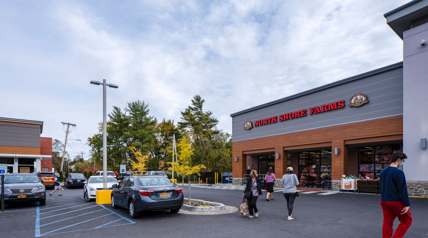 North Shore Farms storefront at Mamaroneck Centre in Mamaroneck, NY featuring a redesigned façade, modern architectural detailing, and improved pedestrian access following the shopping center redevelopment.