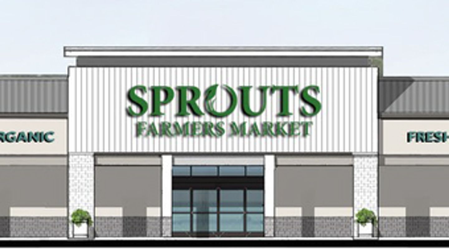 Architectural rendering of the Sprouts Farmers Market storefront at Dalewood Shopping Center in Hartsdale, NY, featuring a modern façade with vertical paneling, large central entryway, brick accents, and prominent green signage.