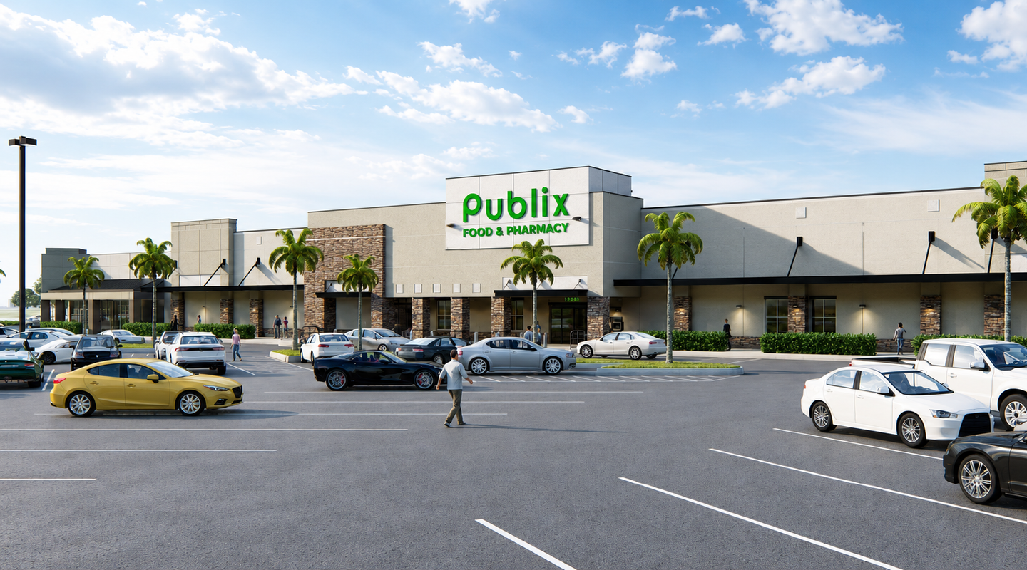 Updated grocery‑anchored retail building at Sunrise Town Center in Sunrise, FL, shown with stone accent columns, wide sidewalks, palm‑lined frontage, and customer vehicles filling the surrounding parking area.